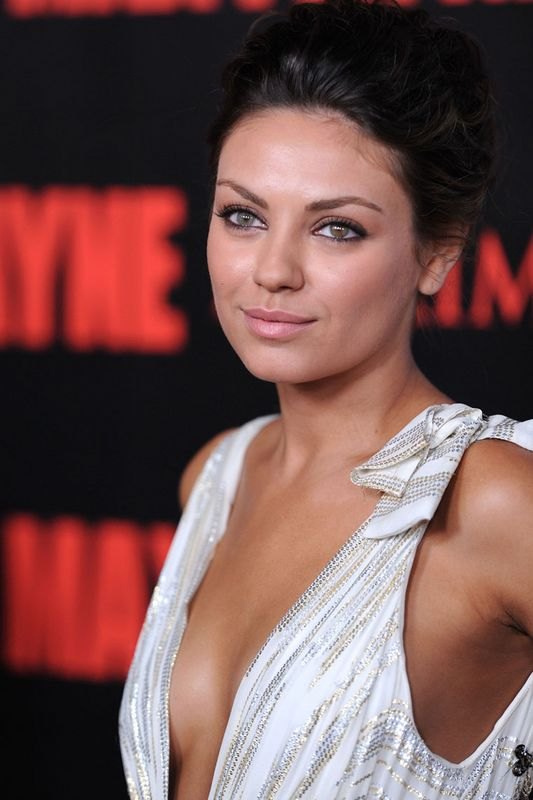 Mila Kunis posing 09